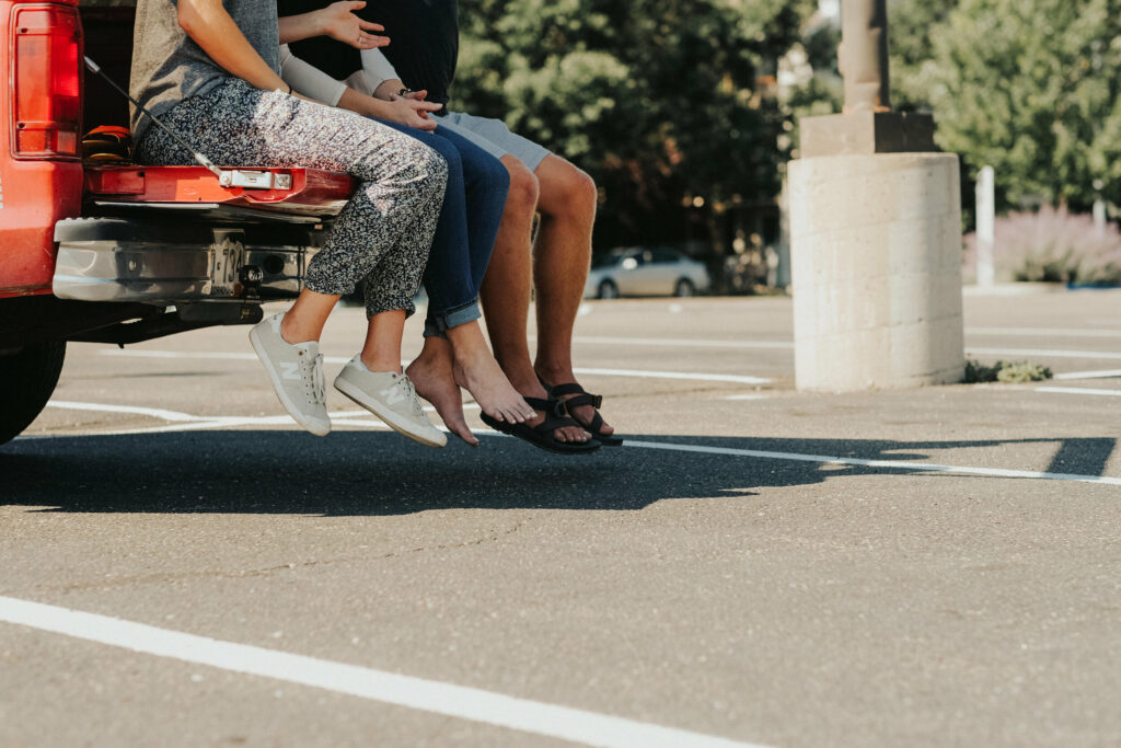 people sitting on car